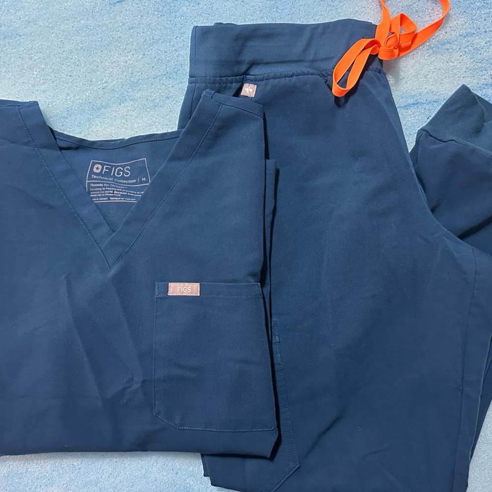 Figs Deep Blue Scrub Set with Bright Orange Accent